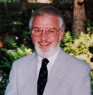 DR. PHILIP COMER